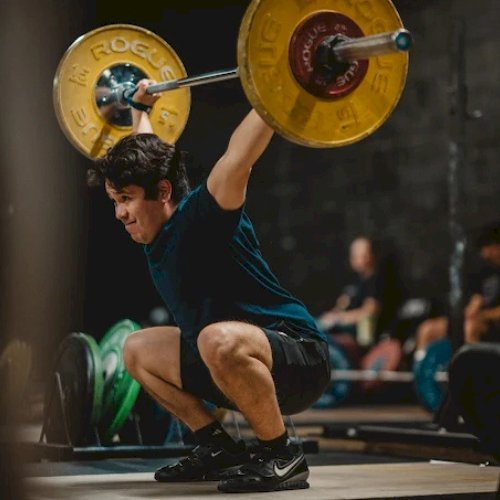 Unlock Peak Performance with a Structured Olympic Lifting Program for Athletes
